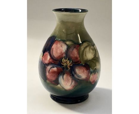 A Moorcroft pansy vase, 16cm high 