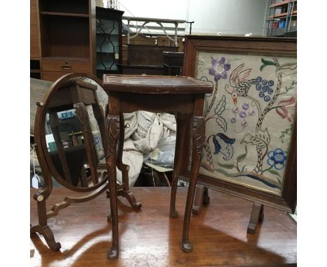 An Edwardian mahogany oval swing toilet mirror on stand, a tapestry fire screen and an occasional table (3)