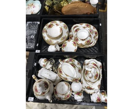 A Royal Albert Old Country Roses tea and dinner ware, including teapot, large plates, bowls, cake stand, cups and saucers etc