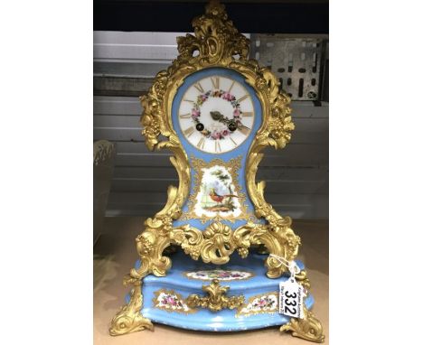 Bourdin, Rue De La Paix, a porcelain and gilt metal mantel clock and stand, painted panels of flowers and a bird, blue ground