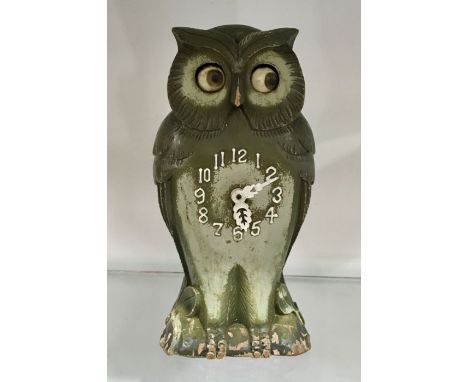 A Continental owl clock, with Arabic numerals, 24cm high