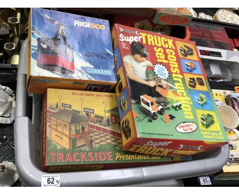 A collection of games and toys, to include Super truck Construction Set, Lehmann Rigi900, Pelham Puppet fairy, Minibrix, a bo