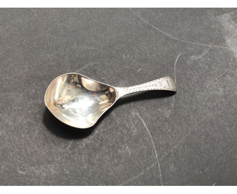 A George III silver caddy spoon, Walter Brind, London 1788, handle engraved MB, 9cm long, 0.31ozt