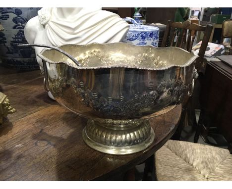 A plated pedestal punch bowl and ladle, 31cm diameter (2)