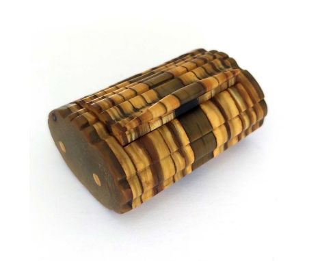 A 19th Century sectional horn pocket snuff box, hinged cover, 6cm wide 