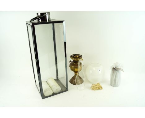 An oil lamp and a candle lantern