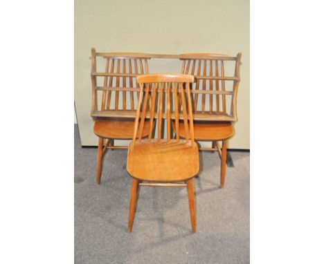 A set of three Ercol wall shelves and three stick back chairs