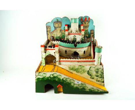 A vintage Geebee toy fort with a selection of plastic and metal model knights