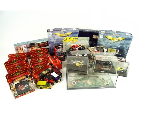 A group of Corgi and other model cars