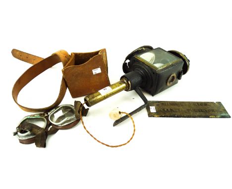 A mixed collection, including an antique car lamp, motorcycle goggles, a leather ommo bag and a brass plaque for a 'County Su