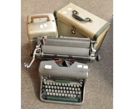 Two projectors and a typewriter