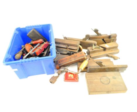 A collection of assorted tools to include planes