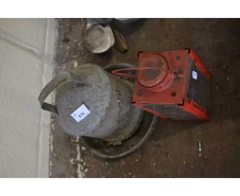 GALVANISED CHICKEN FEEDER AND A RED CANDLE LANTERN