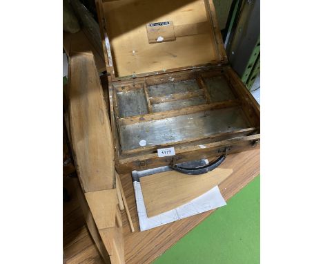 A VINTAGE WOODEN PAINTERS BOX AND BASE OF A WOODEN BOAT 