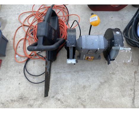 A TITAN BENCH GRINDER AND A BLACK AND DECKER ELECTRIC SAW 