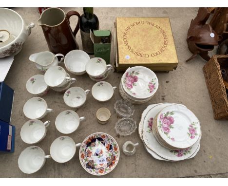 AN ASSORTMENT OF ITEMS TO INCLUDE CERAMIC CUPS AND SAUCERS, COLLECTORS PLATES AND A STONE WARE JUG ETC 