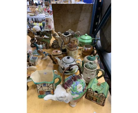 A QUANTITY OF CERAMIC ITEMS TO INCLUDE NOVELTY TEAPOTS TO INCLUDE GIBSONS 