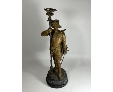 A LARGE SPELTER LAMP BASE MODELLED AS A SWORDSMAN, HEIGHT 59CM 