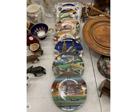 A COLLECTION OF SEVEN POOLE POTTERY CABINET PLATES DIAMETER 15CM 