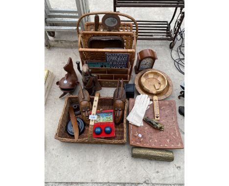 AN ASSORTMENT OF ITEMS TO INCLUDE TREEN FIGURES, A MAGAZINE RACK AND A CLOCK ETC 