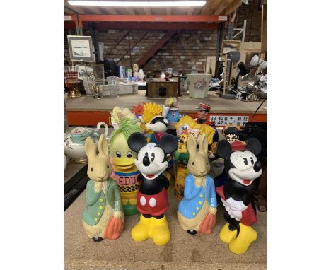 A LARGE QUANTITY OF VINTAGE NOVELTY BUBBLE BATH BOTTLES TO INCLUDE MICKEY AND MINNIE MOUSE, PETER RABBIT, BART SIMPSON, ETC -