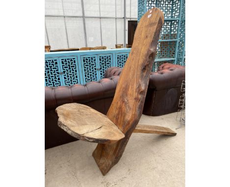 AN AFRICAN STYLE RUSTIC CHAIR - MAKERS MARK IS AN ENCIRCLED K 