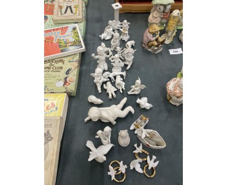 A LARGE QUANTITY OF WHITE CERAMIC MINIATURE FIGURES TO INCLUDE CHERUBS, SHOES, DOVES, ANGELS, ETC 