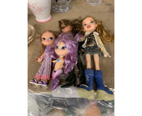 A BAG OF FOUR MATTEL DOLL FIGURES 