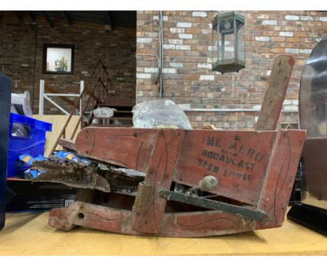A VINTAGE SEED DRILL 