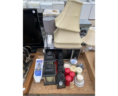 A MICROWAVE OVEN, CANDLE HOLDER AND CANDLES AND A TABLE LAMP ETC 