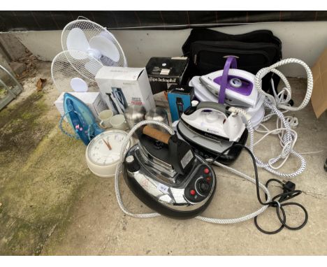 AN ASSORTMENT OF ITEMS TO INCLUDE THREE IRONS, A CLOCK AND A FAN ETC 