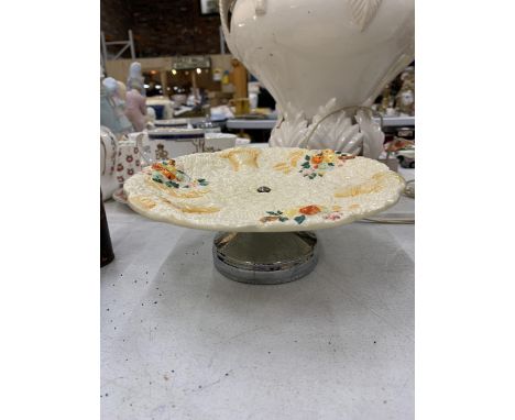 A CLARICE CLIFF 'CELTIC HARVEST' CAKE PLATE ON STAND, DIAMETER 20CM 