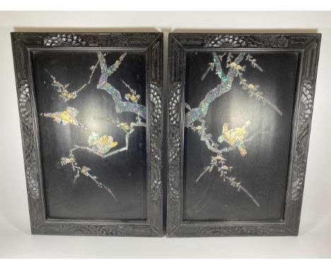 A PAIR OF JAPANESE BLACK LACQUERED AND MOTHER OF PEARL PANELS WITH BIRD AND FLORAL DESIGN, 53.5 X 36CM 
