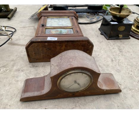 A WOODEN WALL CLOCK AND A SMALL WOODEN MANTLE CLOCK 