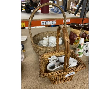 A VICTORIAN DOLL'S PORCELAIN TEASET TO INCLUE A TEAPOT, SUGAR BOWL, JUGS, CUPS, SAUCERS, PLATES, BOWLS, ETC IN TWO WICKER BAS