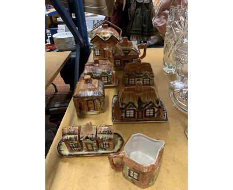 A COLLECTION OF PRICE'S COTTAGE WARE TO INCLUDE A TEAPOT, BUTTER AND CHEESE DISHES, CRUET SET, BISCUIT BARREL, ETC 
