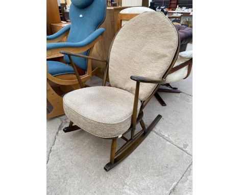 AN ERCOL ROCKING CHAIR 