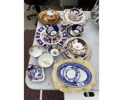 AN ASSORTMENT OF CERAMIC ITEMS TO INCLUDE PLATES, CUPS AND SAUCERS ETC 