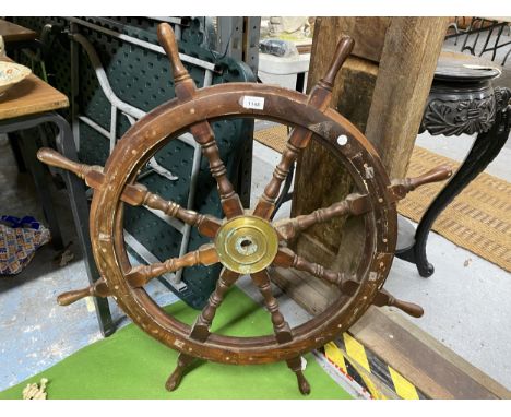 A VINTAGE WOODEN SHIP'S STEERING WHEEL 