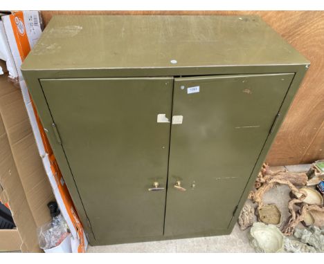 A VINTAGE GREEN METAL TWO DOOR STORAGE CUPBOARD 