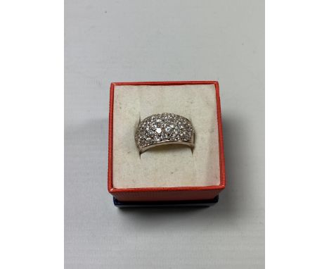 A BOXED LADIES SILVER DRESS RING 