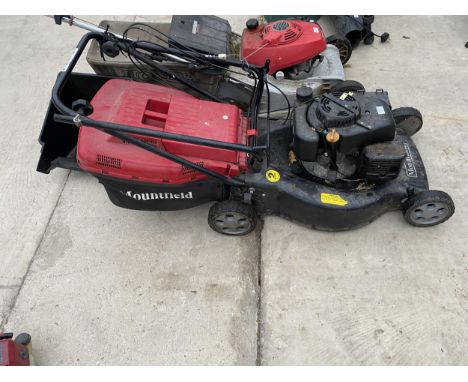 A MOUNTFIELD PETROL ENGINE LAWN MOWER WITH GRASS BOX 