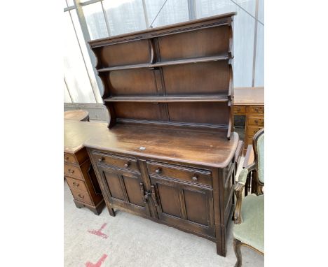 AN ERCOL STYLE DRESSER COMPLETE WITH PLATE RACK 