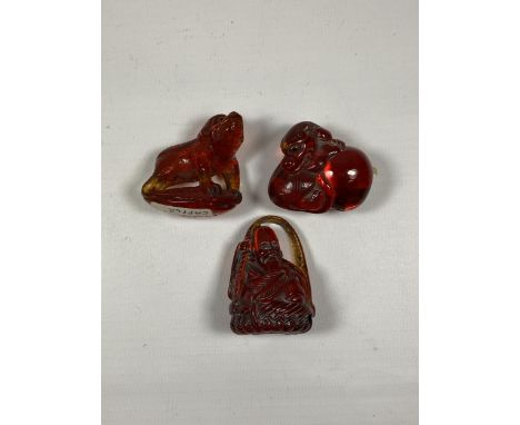 THREE VINTAGE ORIENTAL GLASS NETSUKE FIGURES 