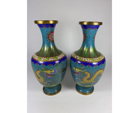 A PAIR OF CHINESE CLOISONNE BALUSTER FORM VASES WITH FIVE CLAW DRAGON CHASING THE FLAMING PEARL DESIGN, HEIGHT 28CM 