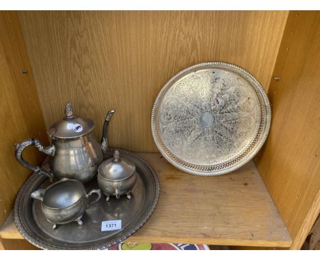 TWO SILVER PLATE TRAYS AND A SILVER PLATE TEA SERVICE TO INCLUDE A TEAPOT, MILK JUG AND SUGAR BOWL 