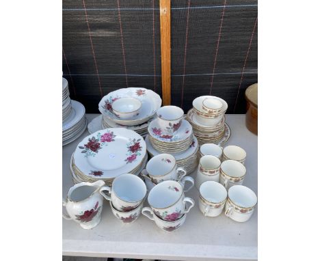 AN ASSORTMENT OF CERAMIC PLATES, CUPS AND SAUCERS ETC 