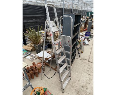 A SIX RUNG ALUMINIUM STEP LADDER AND A FURTHER FOUR RUNG ALUMINIUM STEP LADDER 