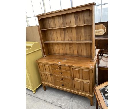 A RETRO ELM ERCOL STYLE DRESSER WITH PLATE RACK BEARING LABEL 