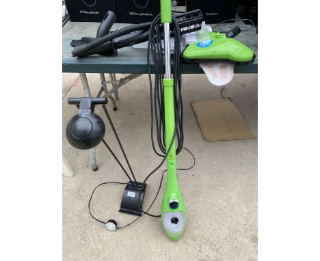 A LAMP AND A H2O STEAM MOP WITH ATTATCHMENTS 